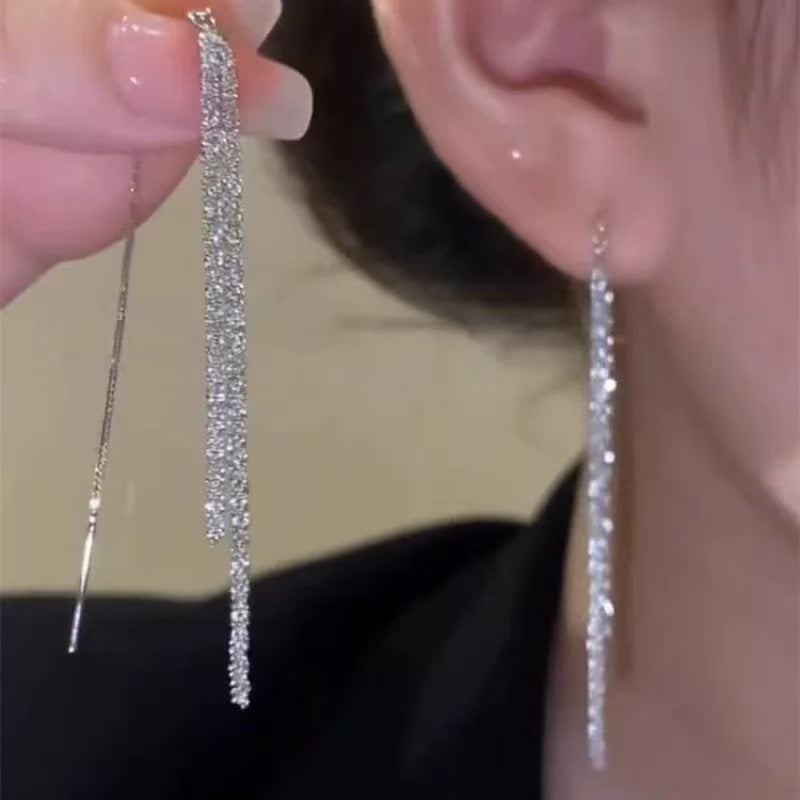 Wholesale Temperament long round face slim galaxy tassel earrings